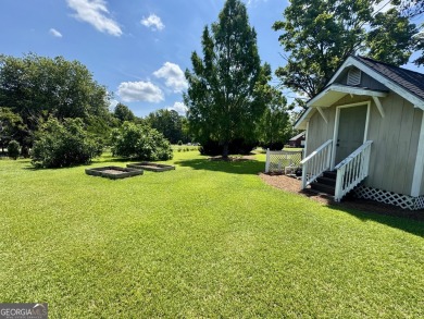Beautiful Brick Home with circle Driveway. Step Inside to a on Dublin Country Club in Georgia - for sale on GolfHomes.com, golf home, golf lot