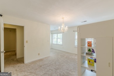 Welcome to this beautifully maintained all-brick townhome that on Dunwoody Country Club in Georgia - for sale on GolfHomes.com, golf home, golf lot