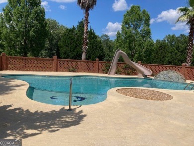 Beautiful Brick Home with circle Driveway. Step Inside to a on Dublin Country Club in Georgia - for sale on GolfHomes.com, golf home, golf lot