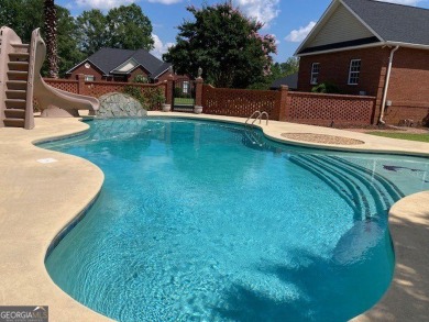 Beautiful Brick Home with circle Driveway. Step Inside to a on Dublin Country Club in Georgia - for sale on GolfHomes.com, golf home, golf lot