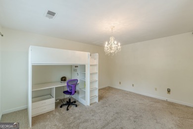 Welcome to this beautifully maintained all-brick townhome that on Dunwoody Country Club in Georgia - for sale on GolfHomes.com, golf home, golf lot
