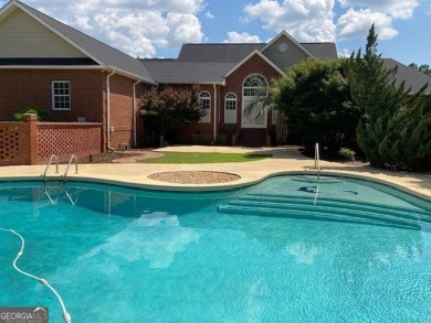Beautiful Brick Home with circle Driveway. Step Inside to a on Dublin Country Club in Georgia - for sale on GolfHomes.com, golf home, golf lot
