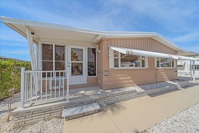 Under contract-accepting backup offers. Welcome home to easy on Pelican Pointe Golf and Country Club in Florida - for sale on GolfHomes.com, golf home, golf lot