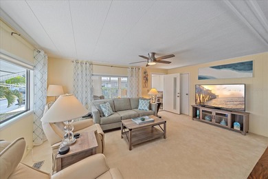 Under contract-accepting backup offers. Welcome home to easy on Pelican Pointe Golf and Country Club in Florida - for sale on GolfHomes.com, golf home, golf lot