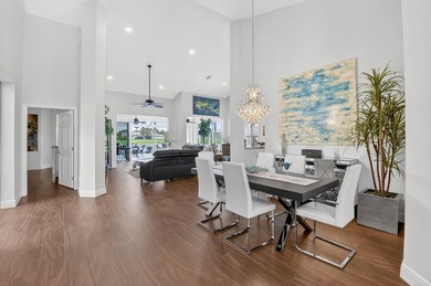 EXTENSIVE RENOVATIONS 3BR/2BA. New ROOF, IMPACT GLASS, extra on Aberdeen Golf and Country Club in Florida - for sale on GolfHomes.com, golf home, golf lot