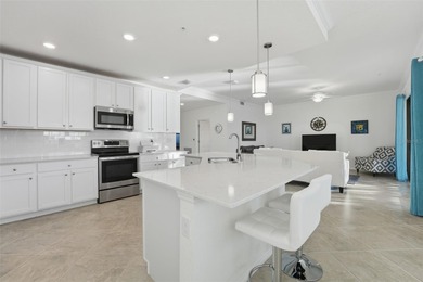 Discover elevated maintenance free Florida living in this on Sarasota National Golf Club in Florida - for sale on GolfHomes.com, golf home, golf lot