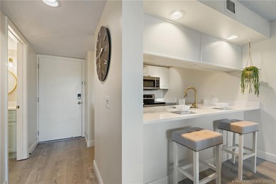 Enjoy sunny, wide views of the lake & golf course from the on Ocean Club At the Hutchinson Island Beach Resort in Florida - for sale on GolfHomes.com, golf home, golf lot