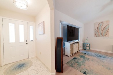 Welcome to this beautifully maintained 2 bedroom, 2-and-a-half on Oyster Creek Golf Club in Florida - for sale on GolfHomes.com, golf home, golf lot