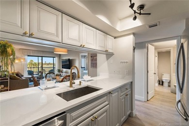 Enjoy sunny, wide views of the lake & golf course from the on Ocean Club At the Hutchinson Island Beach Resort in Florida - for sale on GolfHomes.com, golf home, golf lot