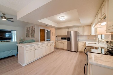 Welcome to this beautifully maintained 2 bedroom, 2-and-a-half on Oyster Creek Golf Club in Florida - for sale on GolfHomes.com, golf home, golf lot