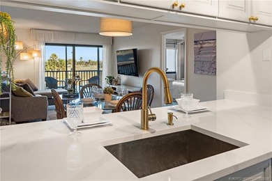 Enjoy sunny, wide views of the lake & golf course from the on Ocean Club At the Hutchinson Island Beach Resort in Florida - for sale on GolfHomes.com, golf home, golf lot