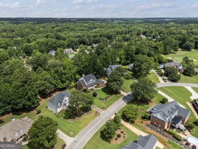 This 4-sided brick 5BR/4.5BA golf course home with a basement on Canongate On White Oak Golf Course in Georgia - for sale on GolfHomes.com, golf home, golf lot