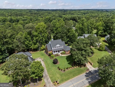 This 4-sided brick 5BR/4.5BA golf course home with a basement on Canongate On White Oak Golf Course in Georgia - for sale on GolfHomes.com, golf home, golf lot