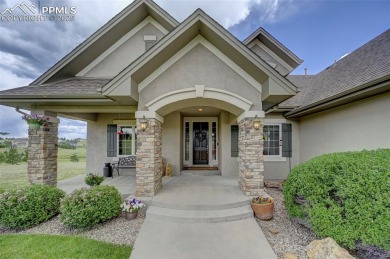 Beautifully situated on a spacious lot with sweeping Front Range on Kings Deer Golf Club in Colorado - for sale on GolfHomes.com, golf home, golf lot