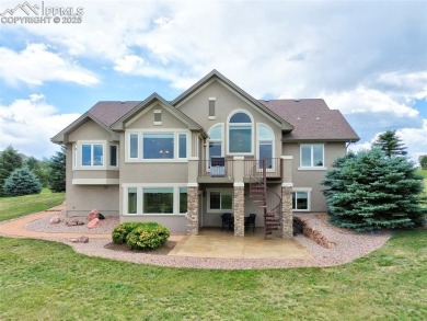 Beautifully situated on a spacious lot with sweeping Front Range on Kings Deer Golf Club in Colorado - for sale on GolfHomes.com, golf home, golf lot