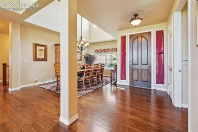 Beautifully situated on a spacious lot with sweeping Front Range on Kings Deer Golf Club in Colorado - for sale on GolfHomes.com, golf home, golf lot