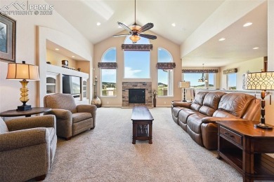 Beautifully situated on a spacious lot with sweeping Front Range on Kings Deer Golf Club in Colorado - for sale on GolfHomes.com, golf home, golf lot
