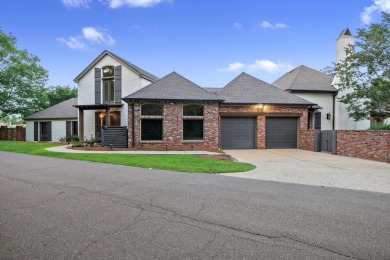 Experience luxury living on the water in sought-after Canebrake! on Canebrake Country Club in Mississippi - for sale on GolfHomes.com, golf home, golf lot