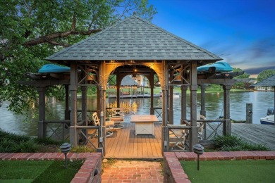Experience luxury living on the water in sought-after Canebrake! on Canebrake Country Club in Mississippi - for sale on GolfHomes.com, golf home, golf lot