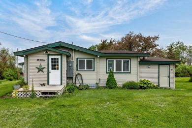 At the end of a quiet private road, sits this charming cedar on Alburg Golf Links in Vermont - for sale on GolfHomes.com, golf home, golf lot