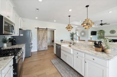 This beautifully updated 3-bedroom, 3-bathroom home offers an on Cape Fear National At Brunswick Forest in North Carolina - for sale on GolfHomes.com, golf home, golf lot