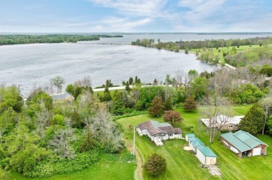 At the end of a quiet private road, sits this charming cedar on Alburg Golf Links in Vermont - for sale on GolfHomes.com, golf home, golf lot