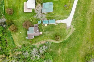 At the end of a quiet private road, sits this charming cedar on Alburg Golf Links in Vermont - for sale on GolfHomes.com, golf home, golf lot
