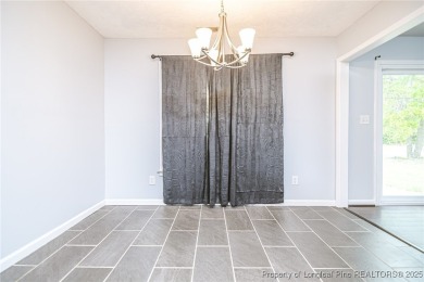 Welcome to this inviting 3-bedroom, 2-bathroom home nestled in on Hope Mills Golf and Country Club in North Carolina - for sale on GolfHomes.com, golf home, golf lot
