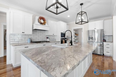 This beautiful home situated on a corner lot offers 3 bedrooms on Goose Pond Colony Resort - Plantation Golf Course in AL - for sale on GolfHomes.com, golf home, golf lot