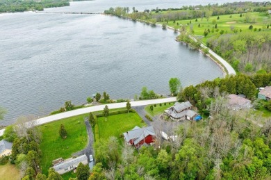 At the end of a quiet private road, sits this charming cedar on Alburg Golf Links in Vermont - for sale on GolfHomes.com, golf home, golf lot