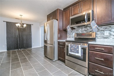 Welcome to this inviting 3-bedroom, 2-bathroom home nestled in on Hope Mills Golf and Country Club in North Carolina - for sale on GolfHomes.com, golf home, golf lot