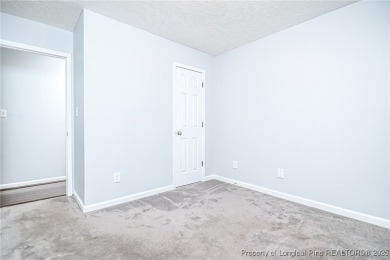 Welcome to this inviting 3-bedroom, 2-bathroom home nestled in on Hope Mills Golf and Country Club in North Carolina - for sale on GolfHomes.com, golf home, golf lot