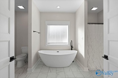 This beautiful home situated on a corner lot offers 3 bedrooms on Goose Pond Colony Resort - Plantation Golf Course in AL - for sale on GolfHomes.com, golf home, golf lot