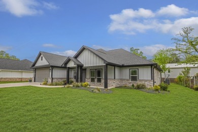 This beautifully custom-built home offers an inviting on Rayburn Country Club in Texas - for sale on GolfHomes.com, golf home, golf lot