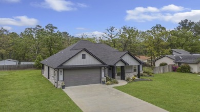 This beautifully custom-built home offers an inviting on Rayburn Country Club in Texas - for sale on GolfHomes.com, golf home, golf lot