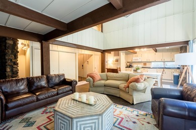 This FURNISHED Eden Isle townhome is right across the street on Red Apple Inn and Country Club in Arkansas - for sale on GolfHomes.com, golf home, golf lot