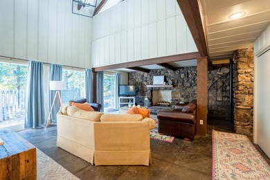 This FURNISHED Eden Isle townhome is right across the street on Red Apple Inn and Country Club in Arkansas - for sale on GolfHomes.com, golf home, golf lot