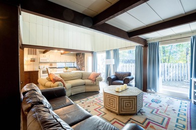 This FURNISHED Eden Isle townhome is right across the street on Red Apple Inn and Country Club in Arkansas - for sale on GolfHomes.com, golf home, golf lot