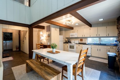 This FURNISHED Eden Isle townhome is right across the street on Red Apple Inn and Country Club in Arkansas - for sale on GolfHomes.com, golf home, golf lot