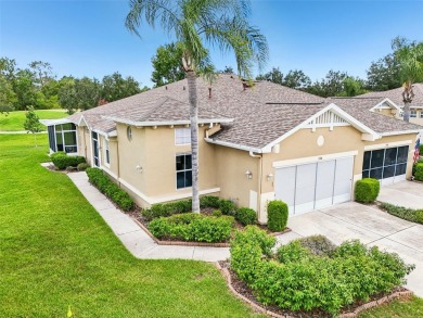 Nestled in a peaceful cul-de-sac and overlooking the 5th green on Scepter Golf Club in Florida - for sale on GolfHomes.com, golf home, golf lot