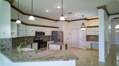 You will truly feel like you've just *struck gold* the minute on Lexington Oaks Golf Club in Florida - for sale on GolfHomes.com, golf home, golf lot