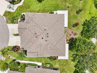 Nestled in a peaceful cul-de-sac and overlooking the 5th green on Scepter Golf Club in Florida - for sale on GolfHomes.com, golf home, golf lot