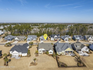 This beautifully updated 3-bedroom, 3-bathroom home offers an on Cape Fear National At Brunswick Forest in North Carolina - for sale on GolfHomes.com, golf home, golf lot