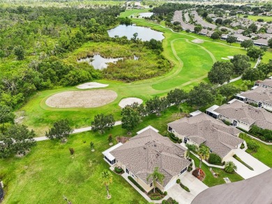 Nestled in a peaceful cul-de-sac and overlooking the 5th green on Scepter Golf Club in Florida - for sale on GolfHomes.com, golf home, golf lot