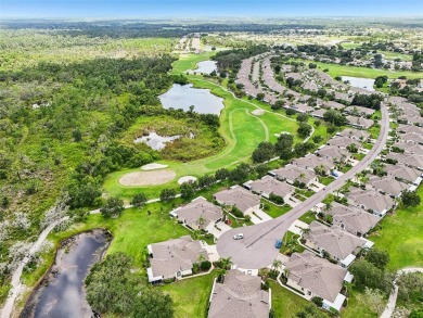 Nestled in a peaceful cul-de-sac and overlooking the 5th green on Scepter Golf Club in Florida - for sale on GolfHomes.com, golf home, golf lot