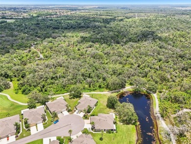 Nestled in a peaceful cul-de-sac and overlooking the 5th green on Scepter Golf Club in Florida - for sale on GolfHomes.com, golf home, golf lot