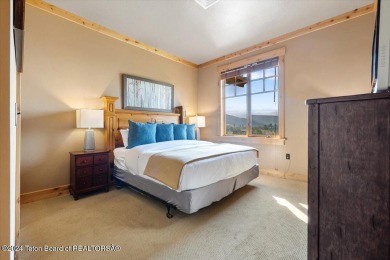 Experience Top-Floor Living with Breathtaking Sunsets at The on Teton Springs Resort and Club in Idaho - for sale on GolfHomes.com, golf home, golf lot