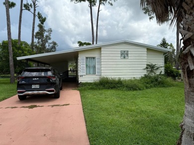 This lovely, home is in an age 55+ community but age 40+ is on Pine Lakes Country Club in Florida - for sale on GolfHomes.com, golf home, golf lot