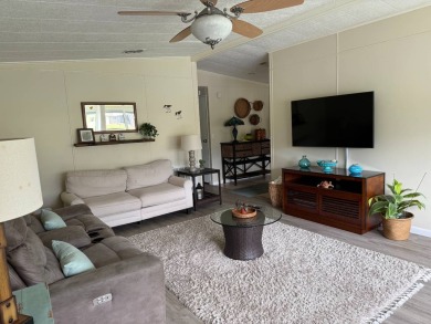 This lovely, home is in an age 55+ community but age 40+ is on Pine Lakes Country Club in Florida - for sale on GolfHomes.com, golf home, golf lot