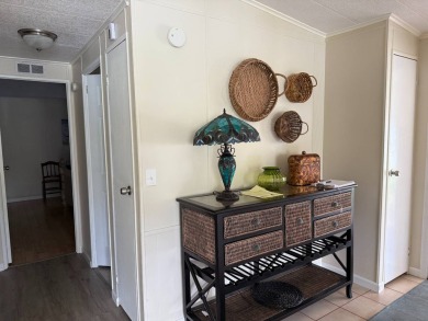 This lovely, home is in an age 55+ community but age 40+ is on Pine Lakes Country Club in Florida - for sale on GolfHomes.com, golf home, golf lot